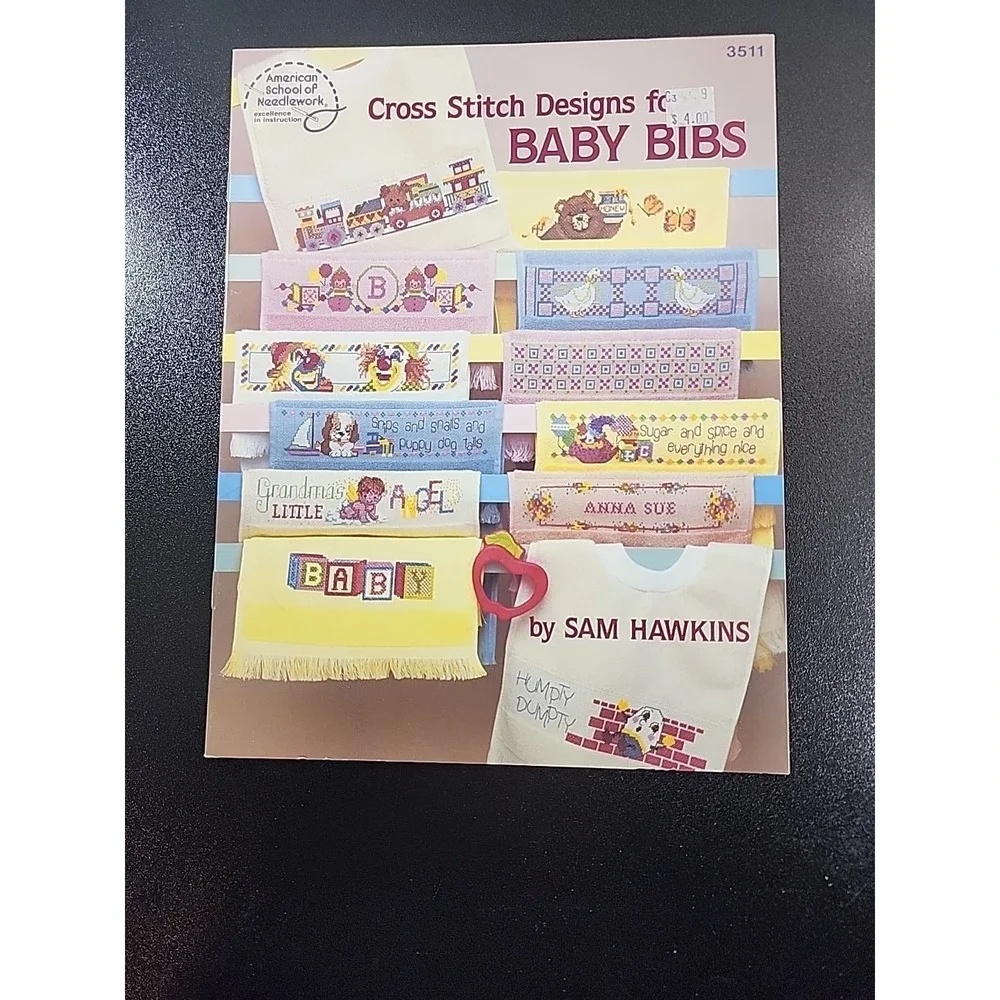 American School of Needlework Baby Bibs Cross Stitch Booklet by Sam Hawkins